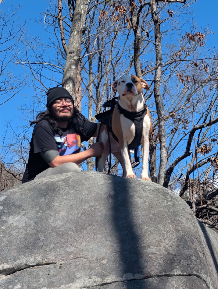 Jeremy and his dog Takeo on a hike